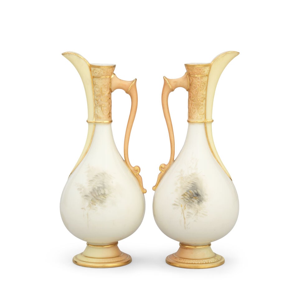 A pair of Royal Worcester ewers by James Stinton, dated 1906 - 2