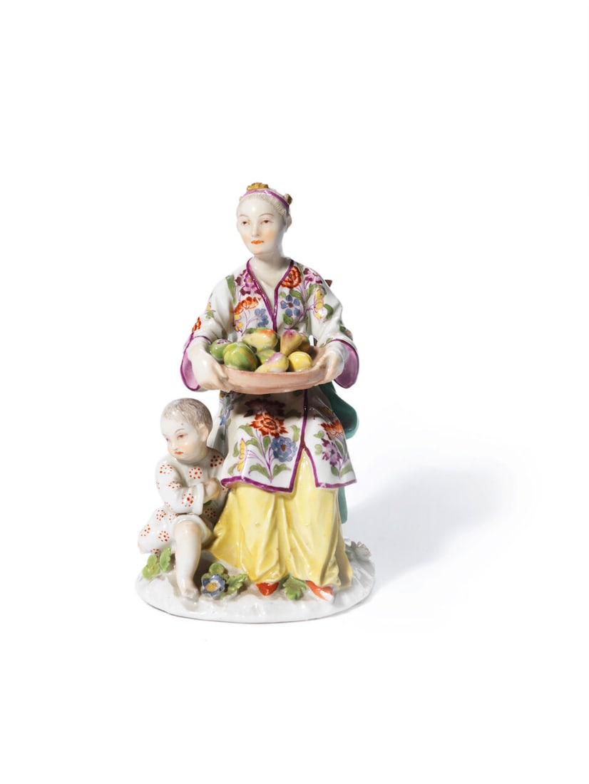 A later-decorated Meissen figure of a Japanese woman and child, the porcelain circa 1745-50: A later-decorated Meissen figure of a Japanese woman and child, the porcelain circa 1745-50 Probably modelled by J.J. Kändler and Peter Reinicke, seated on a high-backed chair holding a fruit bow