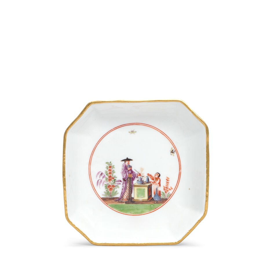 A Meissen octagonal dish, circa 1740: A Meissen octagonal dish, circa 1740 En-suite with the previous lot, painted with a chinoiserie scene within two iron-red concentric circle, insects in flight overhead, the rim gilt, 11.3cm across,