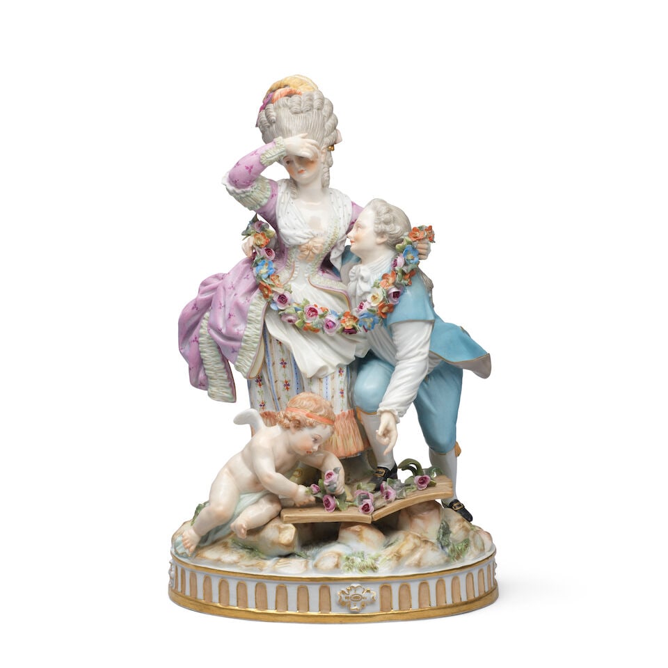 A Meissen group of 'The Broken Bridge', late 19th century: A Meissen group of 'The Broken Bridge', late 19th century After the model by M.V. Acier of 1777, with a swooning lady in a pink and floral gown supported by a gentleman in a pale blue suit in front