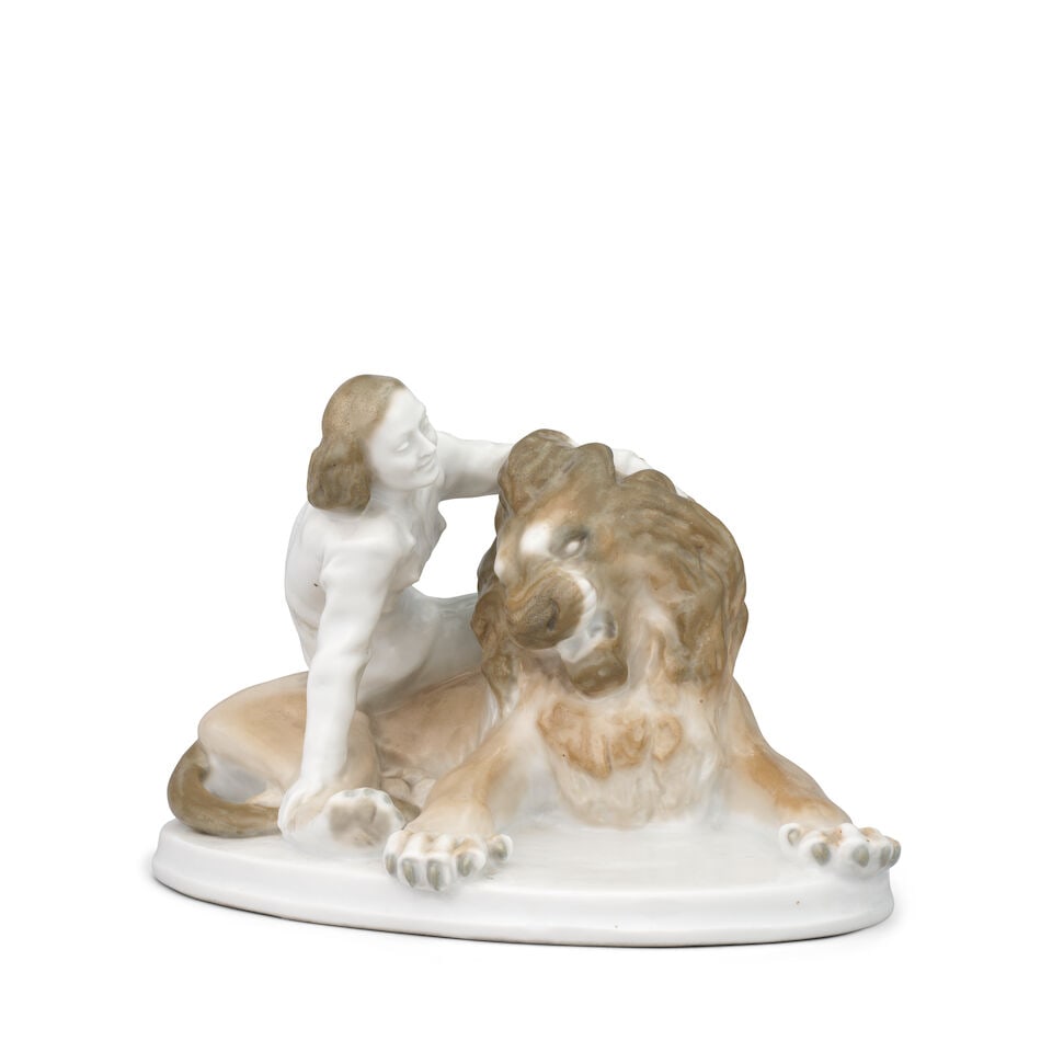 A Russian porcelain group of Irina Bugrimova and her 'pet lion', Lomonosov Porcelain Factory, Le...: A Russian porcelain group of Irina Bugrimova and her 'pet lion', Lomonosov Porcelain Factory, Leningrad, circa 1952-55 Modelled by Boris Iakovlevich Vorobyev, lightly decorated in underglaze colours