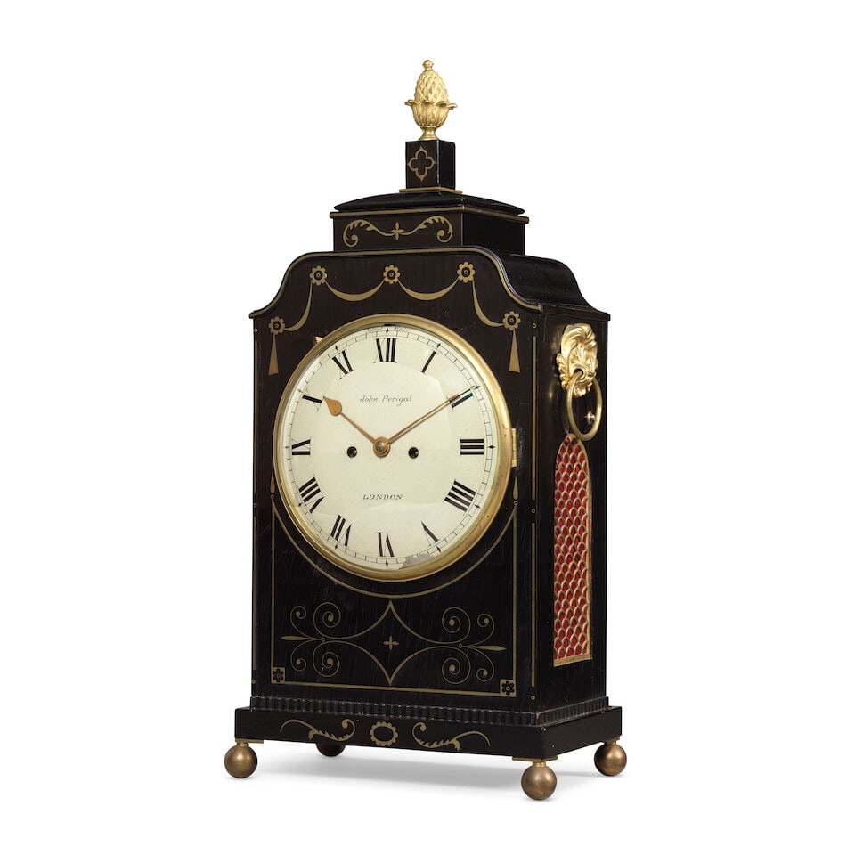 A early 19th century ebonised regency striking table clock John Perigal, London: A early 19th century ebonised regency striking table clock John Perigal, London The case sumounted by a brass finial over a pediment top inlaid with brass detailing, the shaped case top with further
