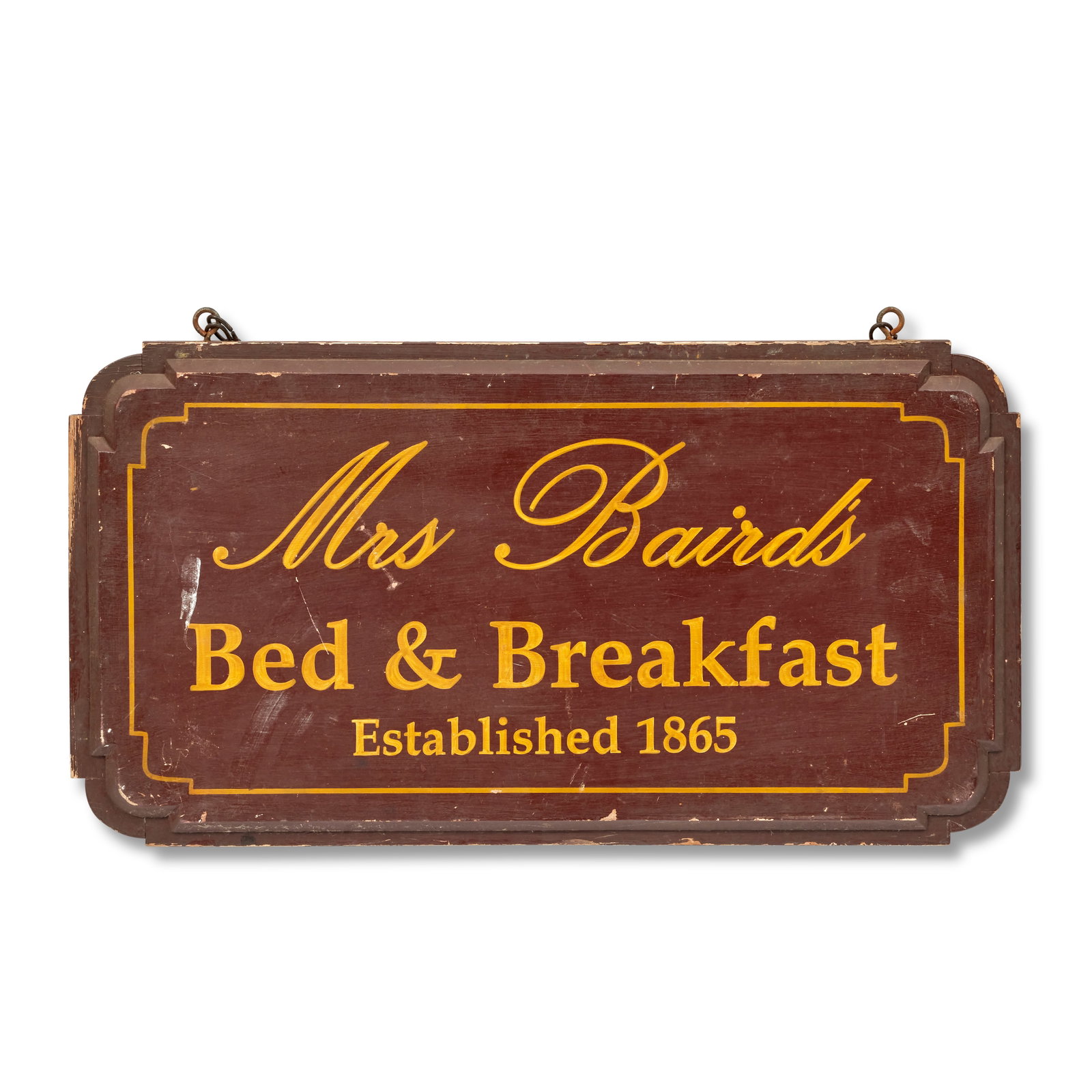 A painted pine double sided sign for 'Mrs Baird's Bed & Breakfast' Season 1, Episode 1, 'Sassenach': A painted pine double sided sign for 'Mrs Baird's Bed & Breakfast' Season 1, Episode 1, 'Sassenach' The shaped rectangular burgundy painted sign surmounted with metal hanging eyes and chains, designed