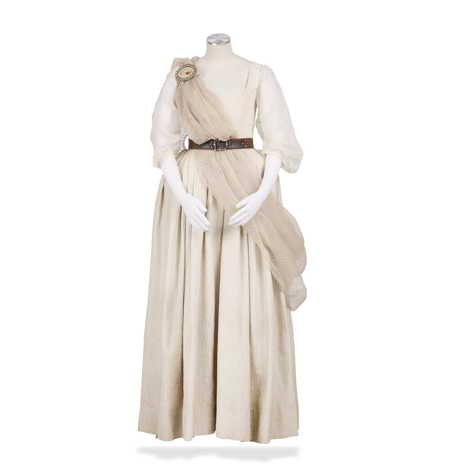 'The Beltane Dress', worn by Geillis Season 1, Episode 4, 'The Gathering' 6: 'The Beltane Dress', worn by Geillis Season 1, Episode 4, 'The Gathering' Comprising: a custom-made cream cotton dress with organza sleeves, with an Outlander label inscribed with 'Geillis.6'; togethe