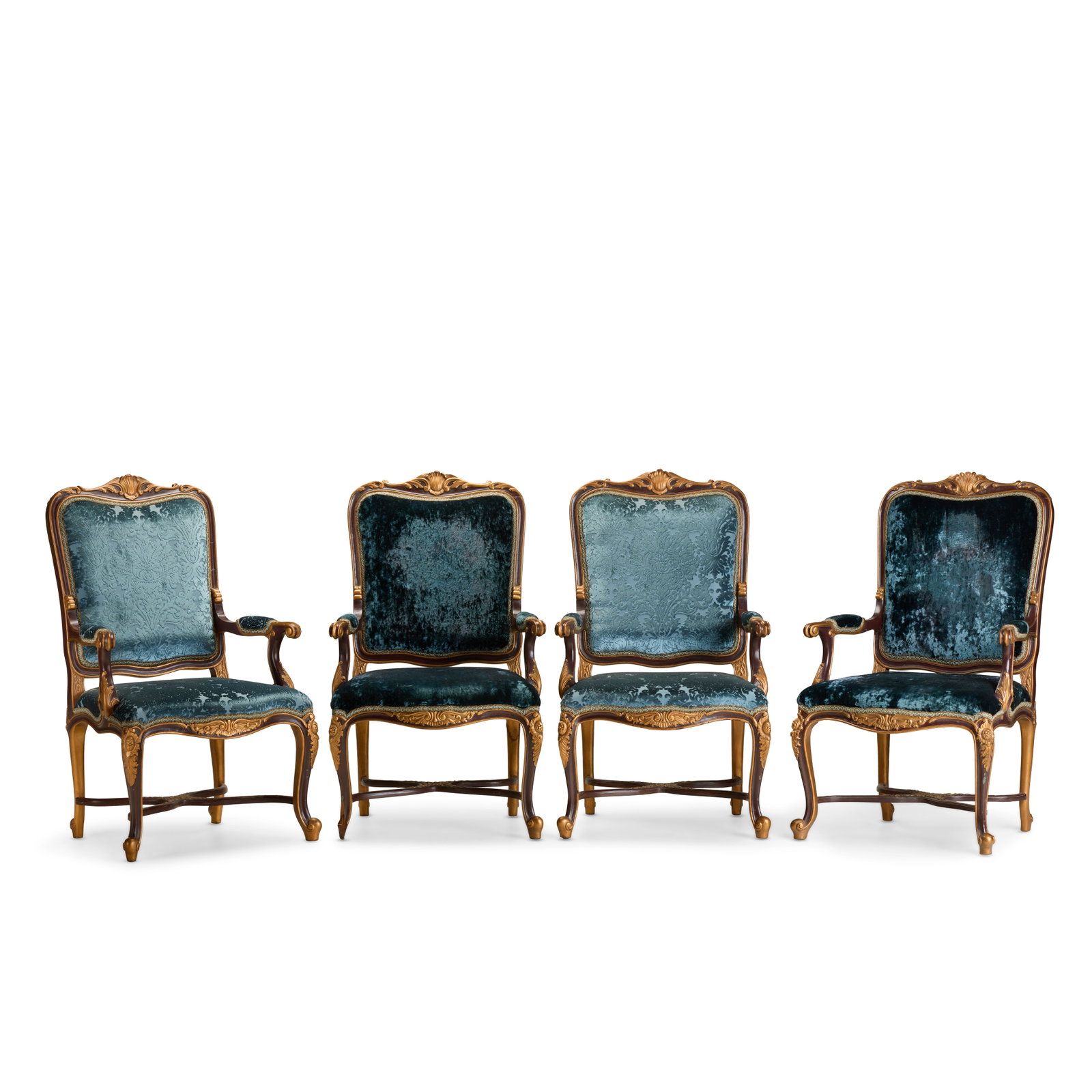 A set of four carved and painted fauteuils in the Louis XIV styleAcquired for Season 2, for the ...: A set of four carved and painted fauteuils in the Louis XIV style Acquired for Season 2, for the Paris Apartment set With shell and scrolled foliate carved top rails above blue velvet damask upholster