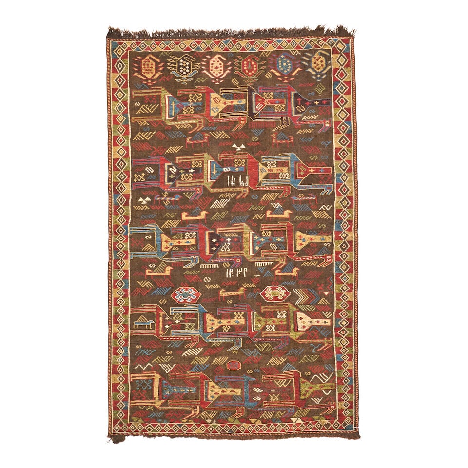 Caucasian Verneh Caucasus 3 ft. 4 in. x 5 ft. 6 in.: Caucasian Verneh Caucasus c. 1825 dated, a wide array of vibrant natural colors, whimsical camel and animal icons, and multiple archaic forms on this early and extremely collectible Caucasian Verneh. 