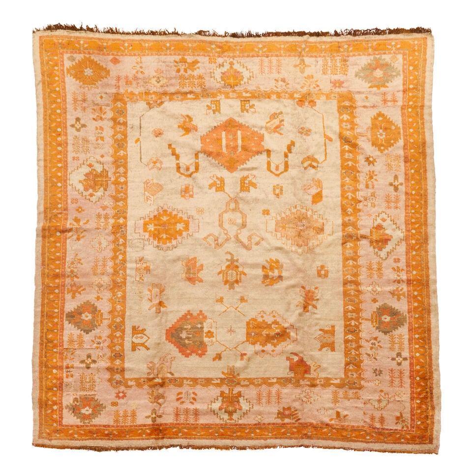 Angora Ushak Carpet Anatolia 9 ft. 6 in. x 10 ft. 4 in.: Angora Ushak Carpet Anatolia c. late 19th century/early 20th century. Natural colors, thick pile, and a desirable square format. 9 ft. 6 in. x 10 ft. 4 in. For further information on this lot please v