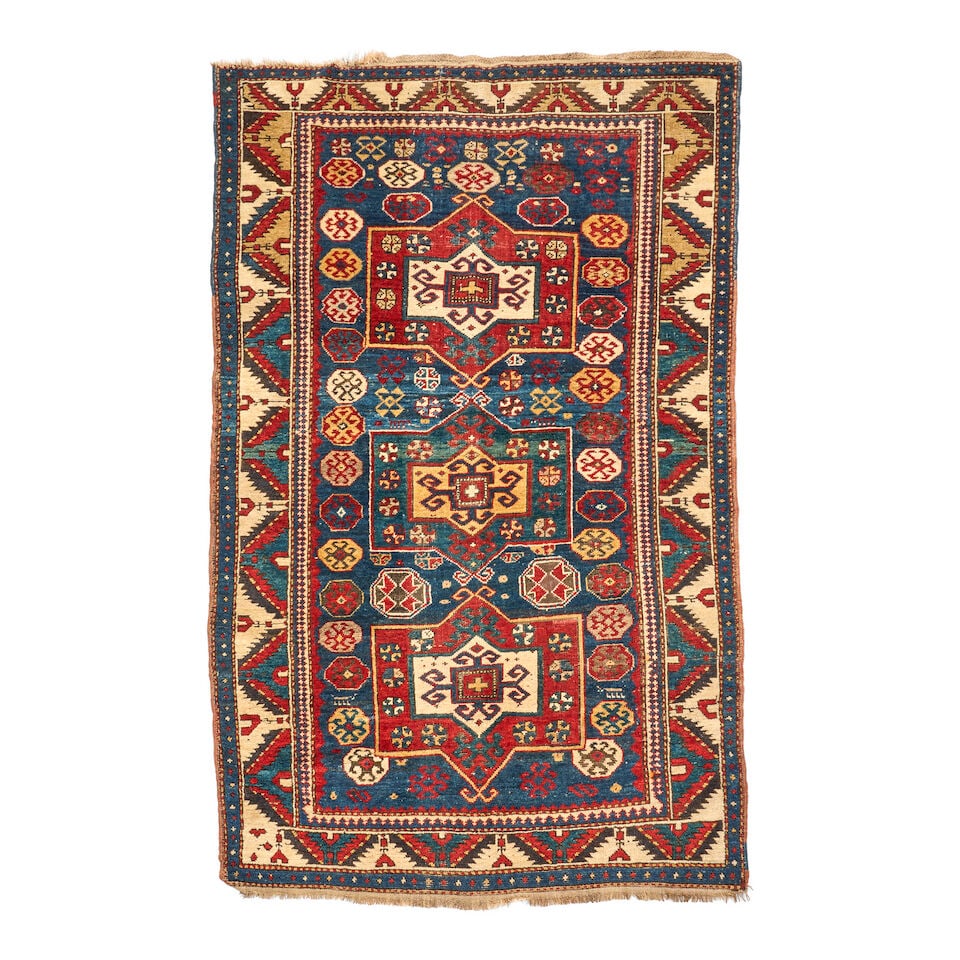 Fachralo Kazak Rug Caucasus 4 ft. 8 in. x 7 ft. 9 in.: Fachralo Kazak Rug Caucasus c. late 19th century, nice thick weave with a spacious border and nice, pleasant colors 4 ft. 8 in. x 7 ft. 9 in. For further information on this lot please visit Bonhams.c