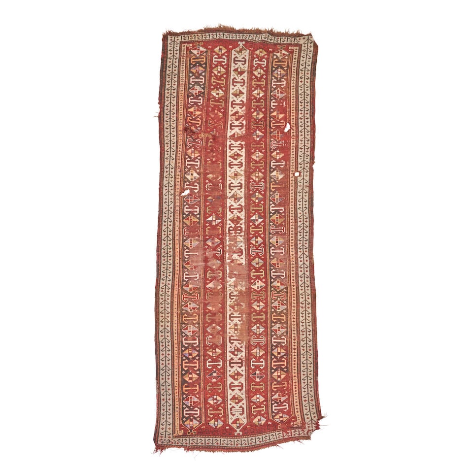 East Anatolian Kars Long Rug Anatolia 4 ft. 3 in. x 13 ft. 7 in.: East Anatolian Kars Long Rug Anatolia c. late 19th century/early 20th century, a charming and restorable rug representing the weaving culture of the time in the Kars region. Has a similar palate to Ka