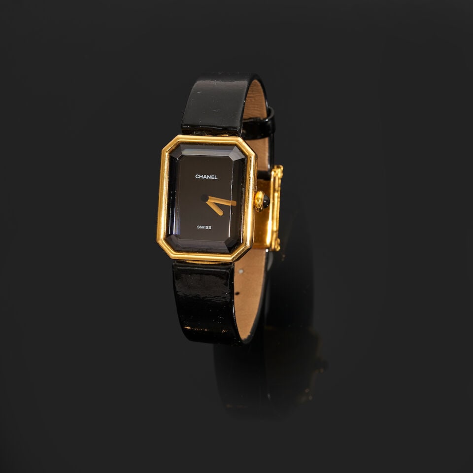 Chanel 1987. Montre Première en or jaune 750°/°° et cuir vernis noir. Chanel... (1 of 3)
