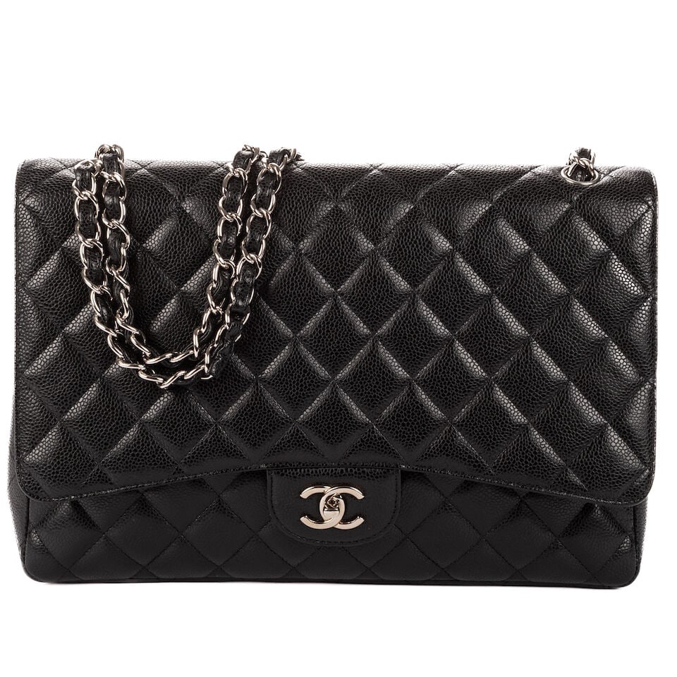 Chanel, circa 2009. Sac classique Jumbo double rabat en cuir noir matelassé. Chanel, circa ...: Chanel, circa 2009. Sac classique Jumbo double rabat en cuir noir matelassé. Chanel, circa 2009. Classic Jumbo double-flap bag in quilted black leather. Fermoir logo en métal chromé sur