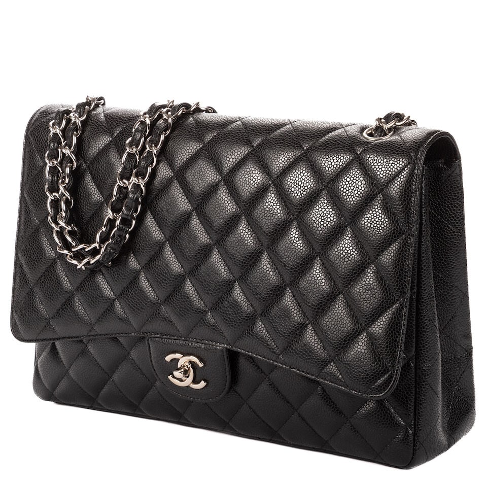 Chanel, circa 2009. Sac classique Jumbo double rabat en cuir noir matelassé. Chanel, circa ... - 2