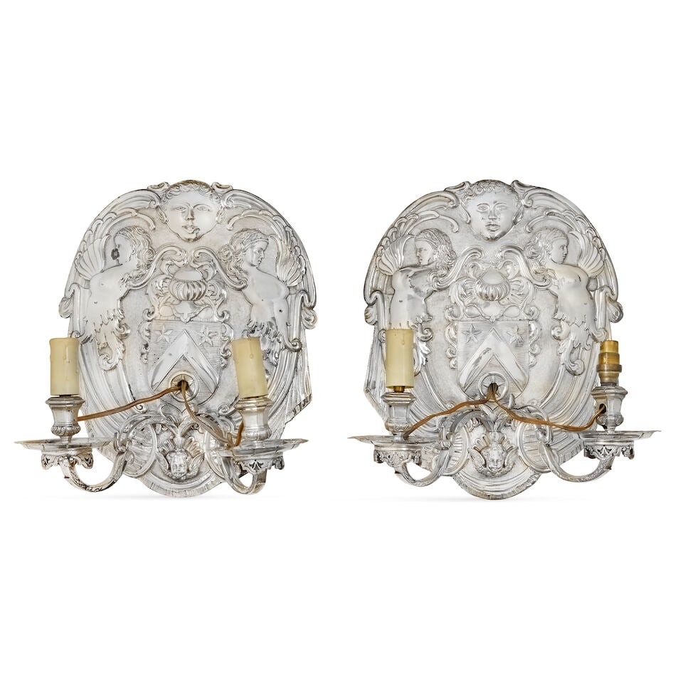 A pair of Continental silver plated twin light wall appliques in the Baroque stye, together with... (1 of 2)