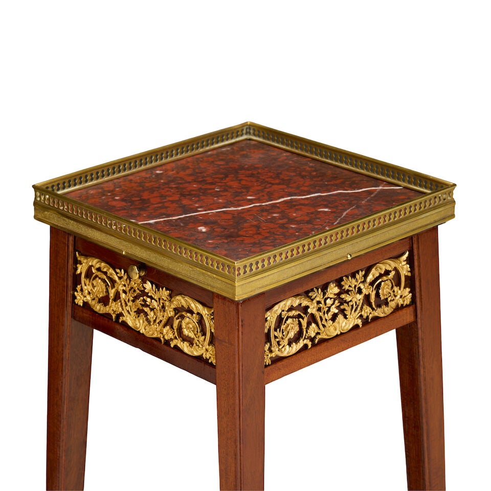 A near pair of French gilt bronze mounted mahogany urn stands or selettesEarly 20th century, in ... - 2