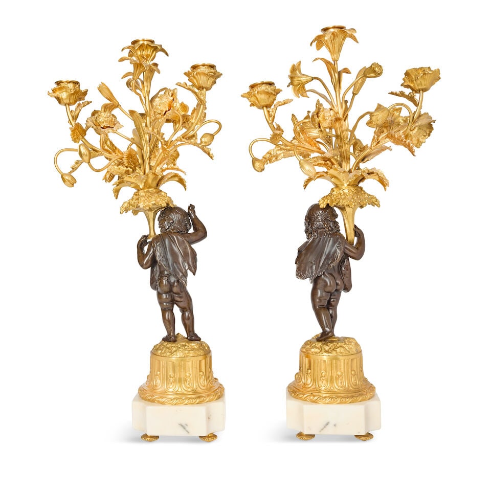 A pair of French patinated and gilt bronze four light figural candelabra in the Louis XVI style ... - 2
