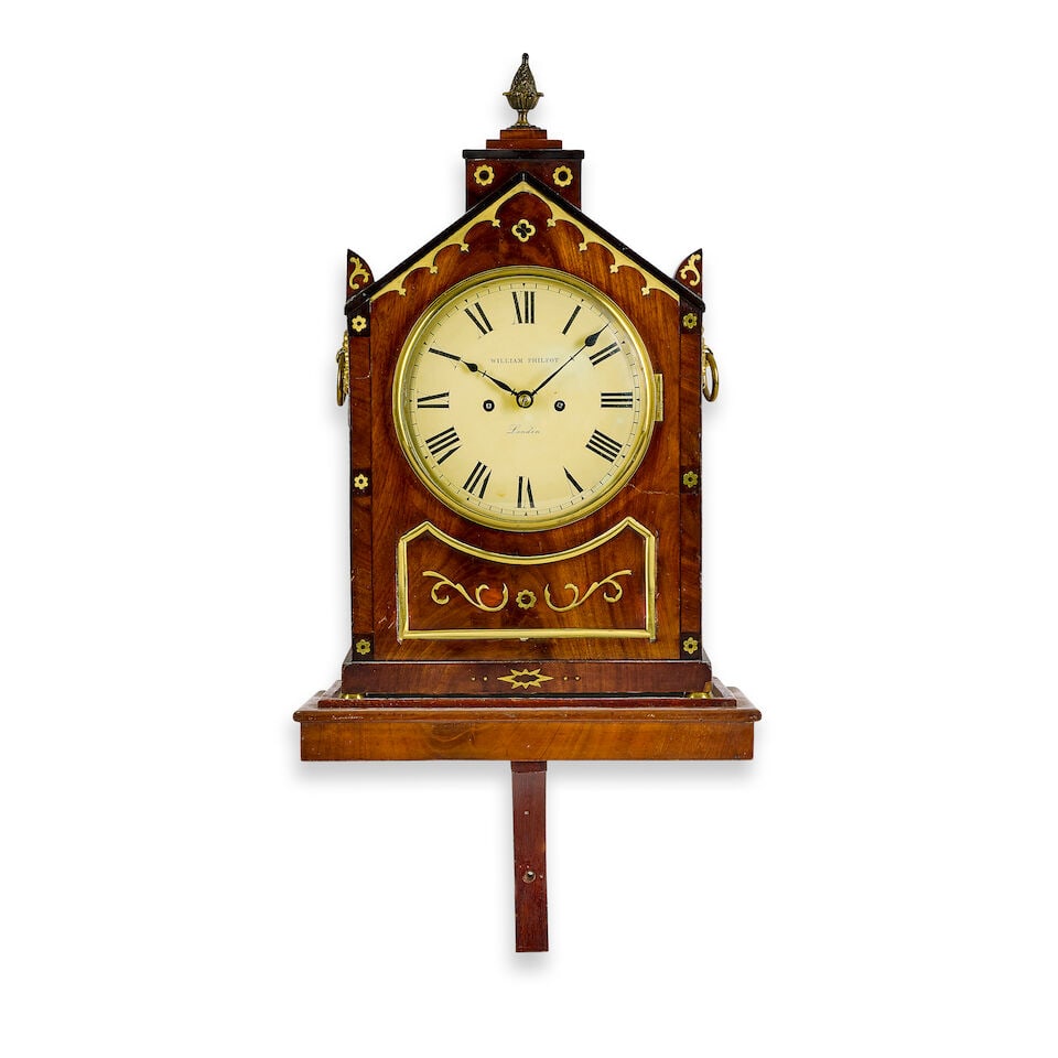 A late Regency mahogany and brass inlaid bracket clock with pull repeat, together with a matched...: A late Regency mahogany and brass inlaid bracket clock with pull repeat, together with a matched mahogany bracket with pull repeat The dial signed William Philpot, London The pedimented rectangular