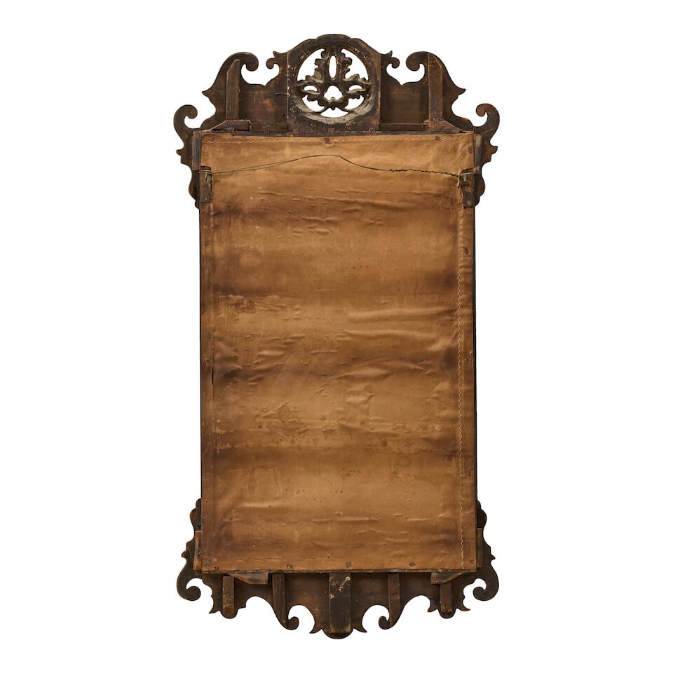 A matched pair of parcel gilt fret carved mirrors The George II red walnut mirror: 1740-1750; th... - 2