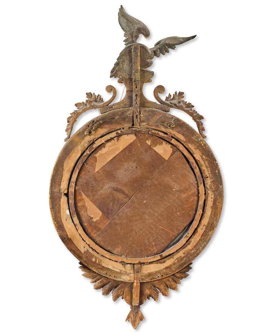 A Regency giltwood and patinated bronze decorated convex mirror Circa 1815 - 2
