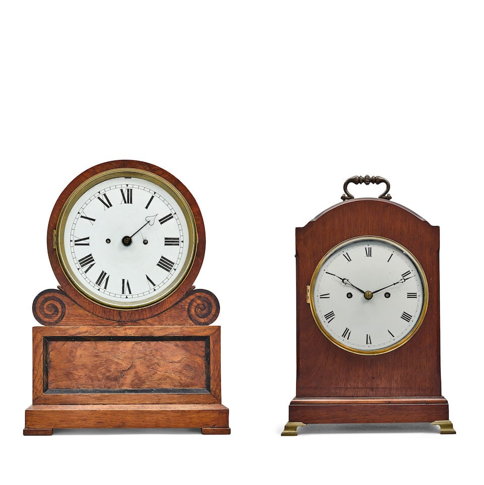 A late Victorian oak and ebonised drumhead table clock together with an Edwardian brass mounted ... (1 of 5)