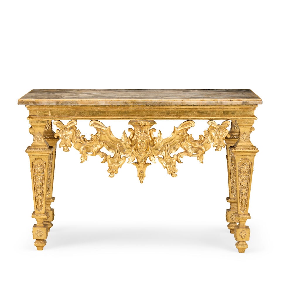 An Italian giltwood and gilt gesso pier table Largely 18th century, with a later (probably 19th ...: An Italian giltwood and gilt gesso pier table Largely 18th century, with a later (probably 19th century) Roman marble top and the apron possibly associated The later marble top with an ovolo moulded