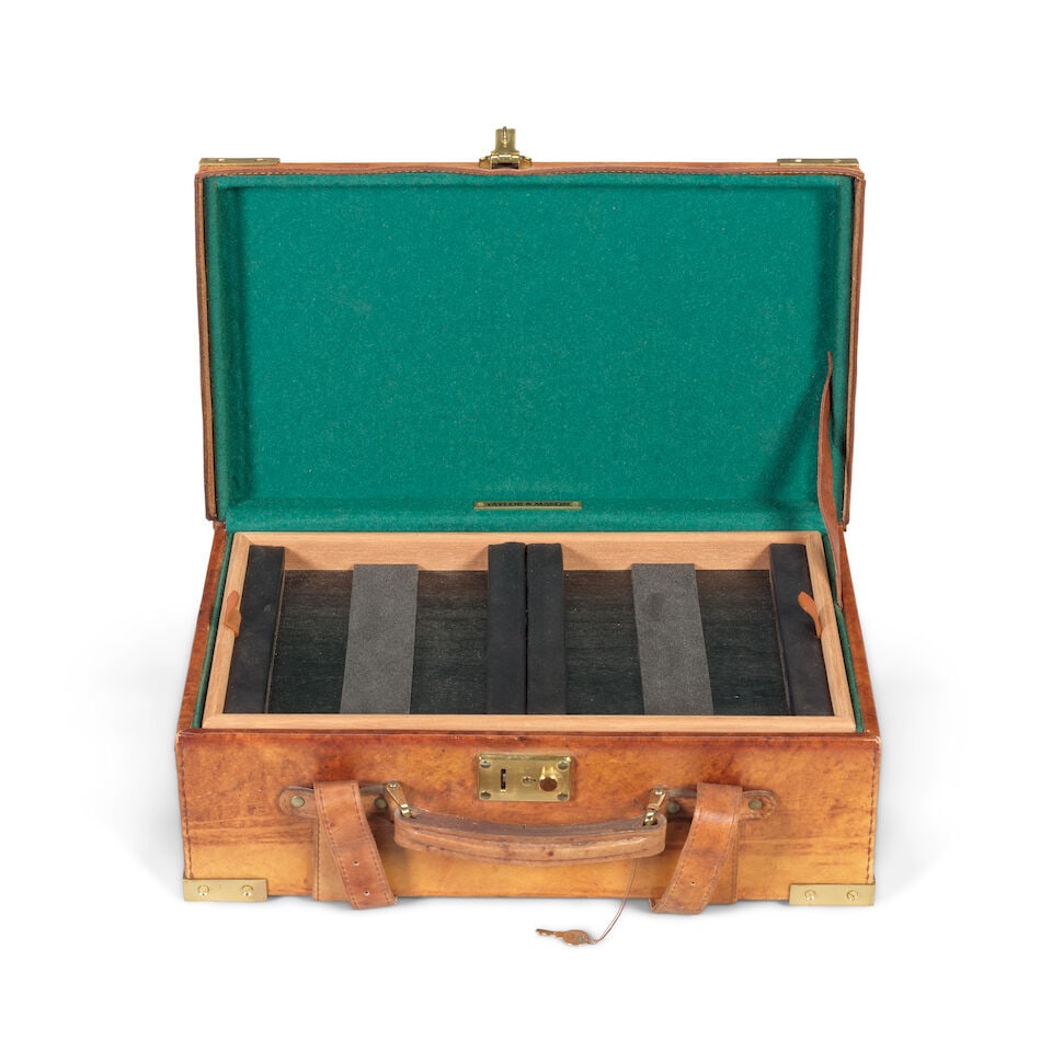 A late 19th/early 20th century tan leather attaché case converted into a cartridge magazin... - 2