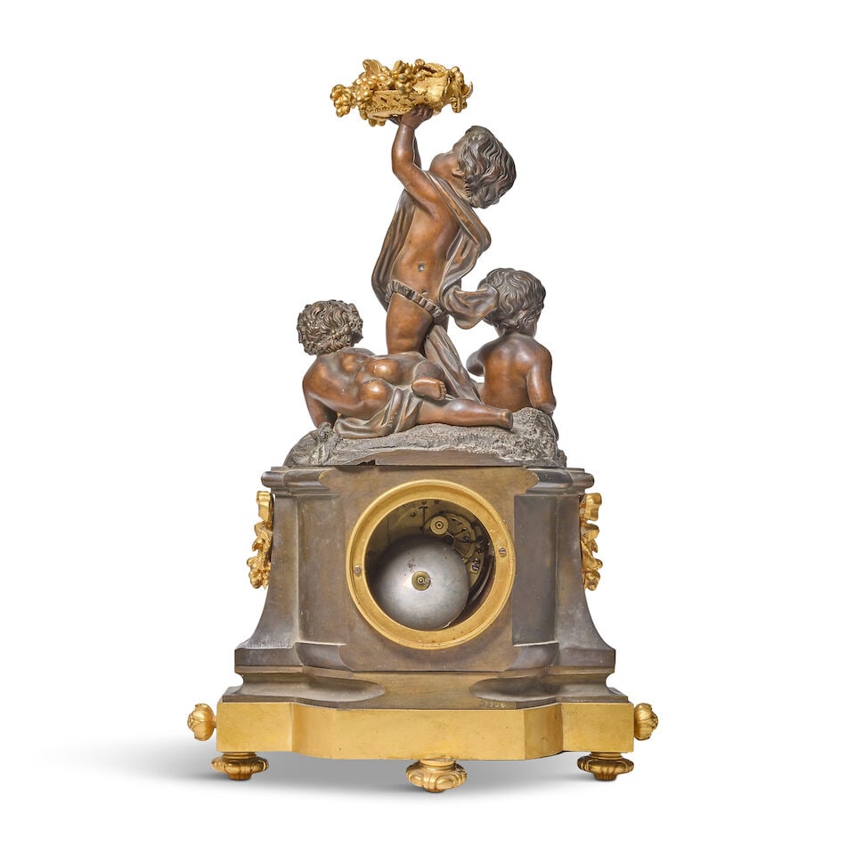 A Napoleon III gilt and patinated bronze figural mantel clock The dial and movement signed and s... - 2