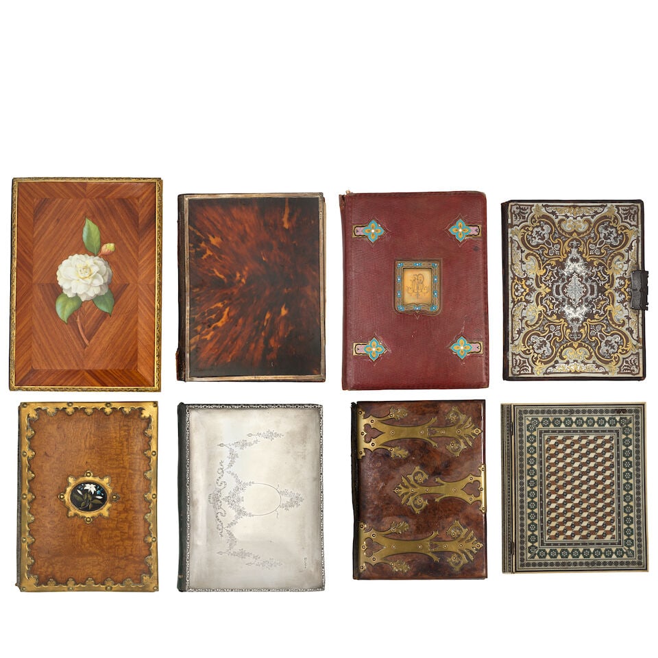 An Edwardian silver blotter cover together with seven other various late 19th and early 20th cen...: An Edwardian silver blotter cover together with seven other various late 19th and early 20th century blotter covers The first with ribbon tied and floral garland engraved decoration, hallmarked for