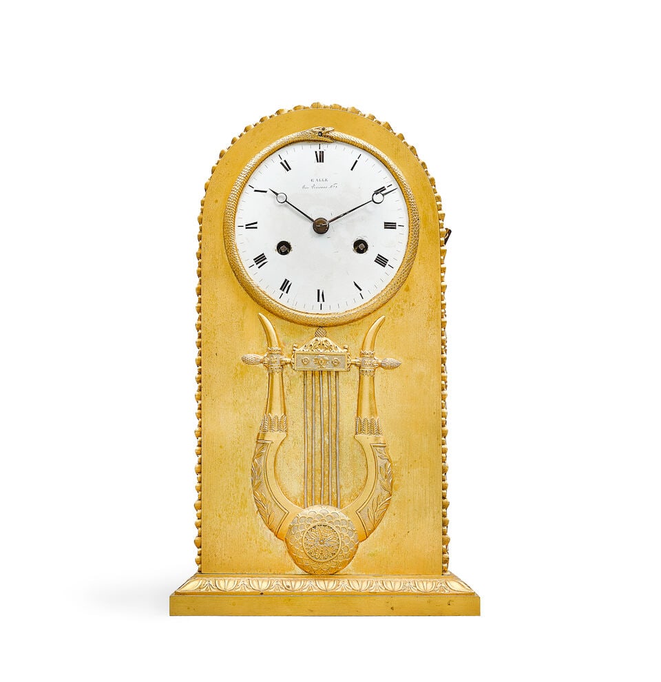 An Empire gilt bronze mantel clock Attributed to Claude Galle (French, 1759-1815) (1 of 3)