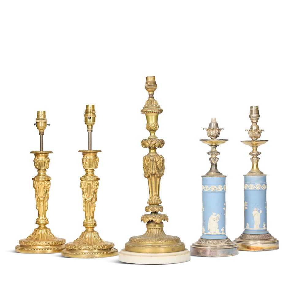 A pair of French gilt bronze candlesticks later adapted as lampbases, a similar larger gilt bron... - 2
