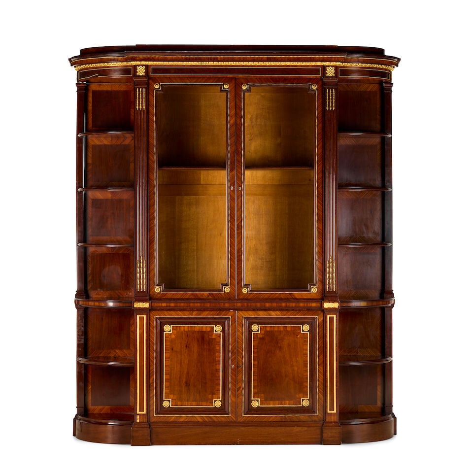 A very large French late 19th century ormolu mounted kingwood, mahogany and amaranth breakfront ...: A very large French late 19th century ormolu mounted kingwood, mahogany and amaranth breakfront bibliotheque or vitrine In the Louis XVI style With quarter veneered doors and panelling, the
