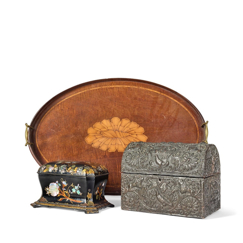 A Jennens and Betteridge papier mache tea caddy together with a miniature mahogany chest of draw... (1 of 5)