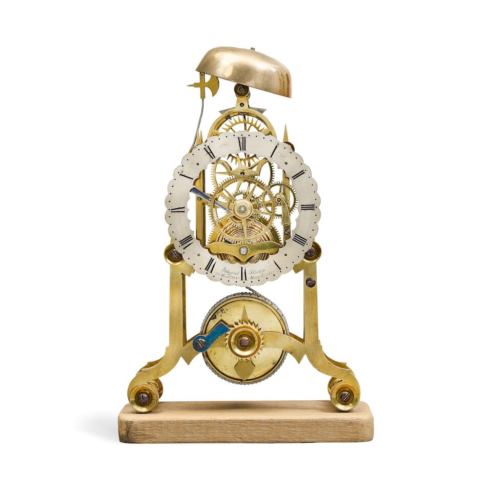 A mahogany wall clock together with an ebonised table clock, a small brass skeleton timepiece wi... - 6