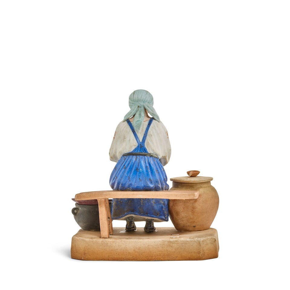 A porcelain figural group of a peasant woman at workGardner Porcelain Factory, Moscow, late 19th... - 2