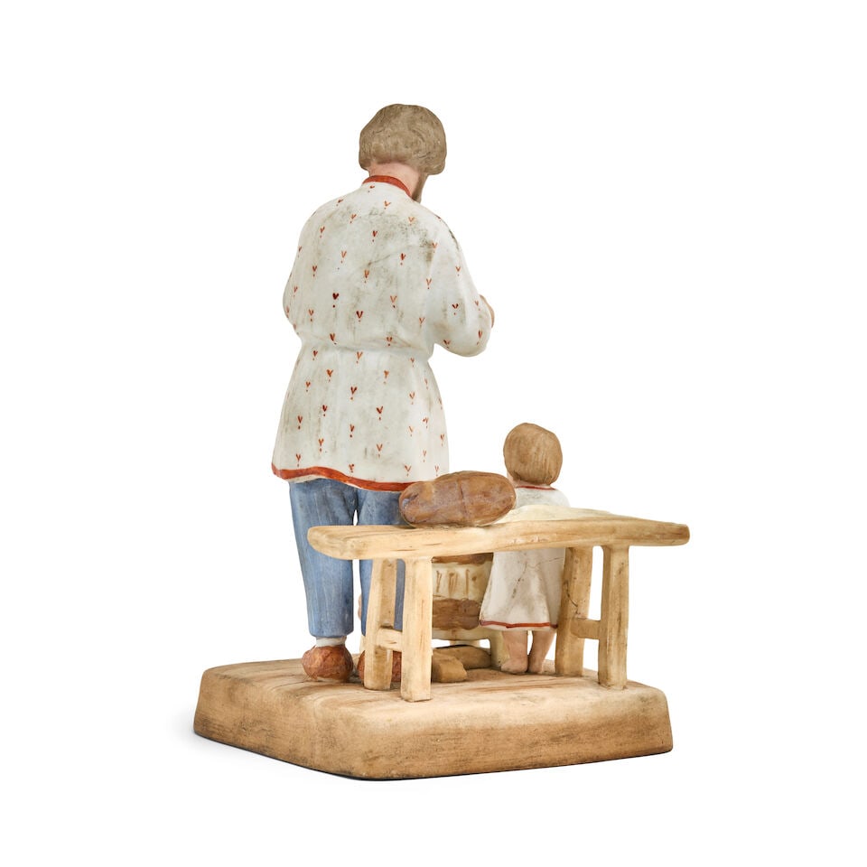 A figure group of a peasant and childGardner Porcelain Factory, Moscow, late 19th - early 20th c... - 2