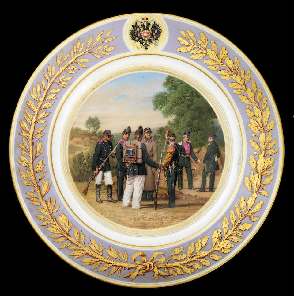 A porcelain military plate Imperial Porcelain Factory, painted by V. Kirsanov, St. Petersburg, p...: A porcelain military plate Imperial Porcelain Factory, painted by V. Kirsanov, St. Petersburg, period of Alexander II, 1871 circular, the centre painted with the Life-Guards Tsarskoselski Rifle