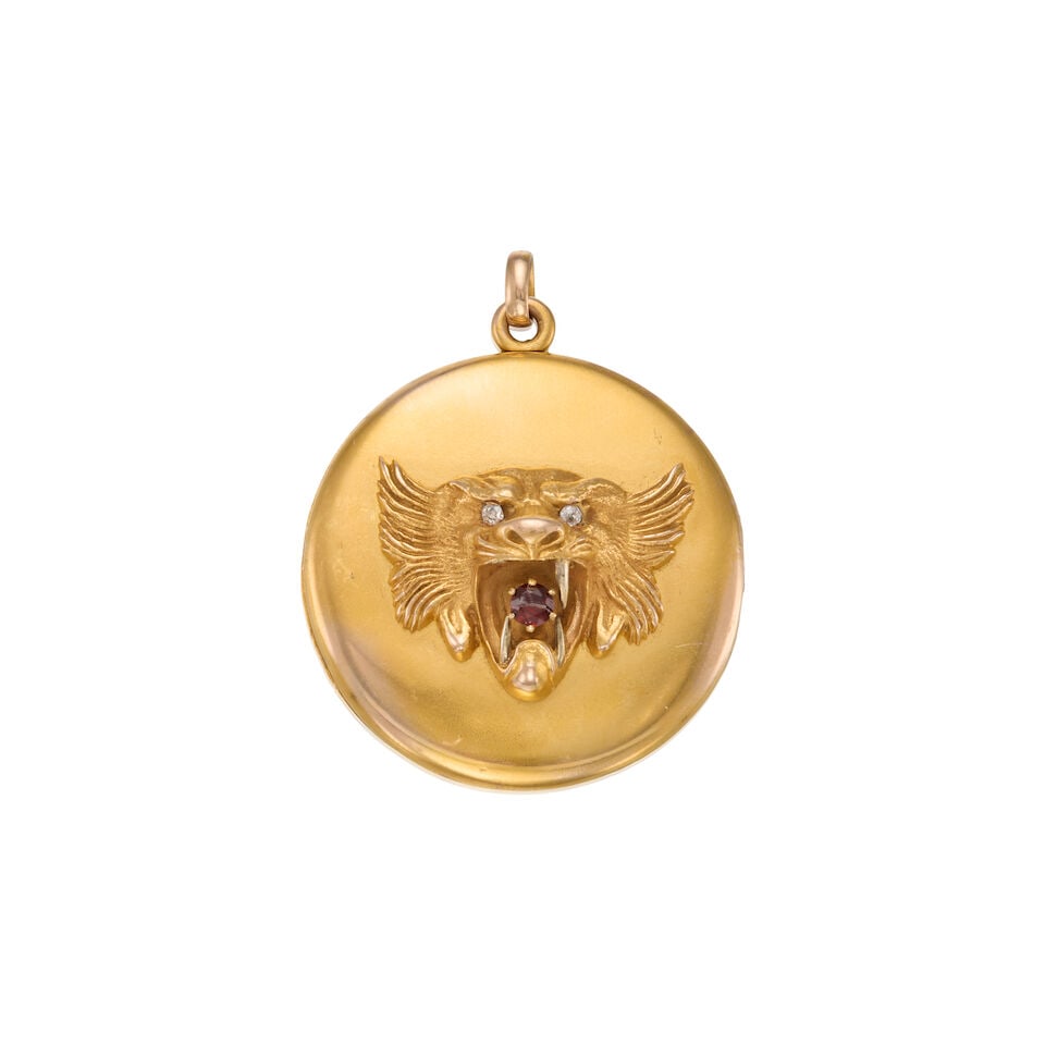 ANTIQUE 13K BLOOMED GOLD AND GEMSET LOCKET PENDANT: ANTIQUE 13K BLOOMED GOLD AND GEMSET LOCKET PENDANT • One round shaped red stone measuring approximately 3.65m in diameter • Two round shaped diamonds weighing approximately 0.04 carat tota