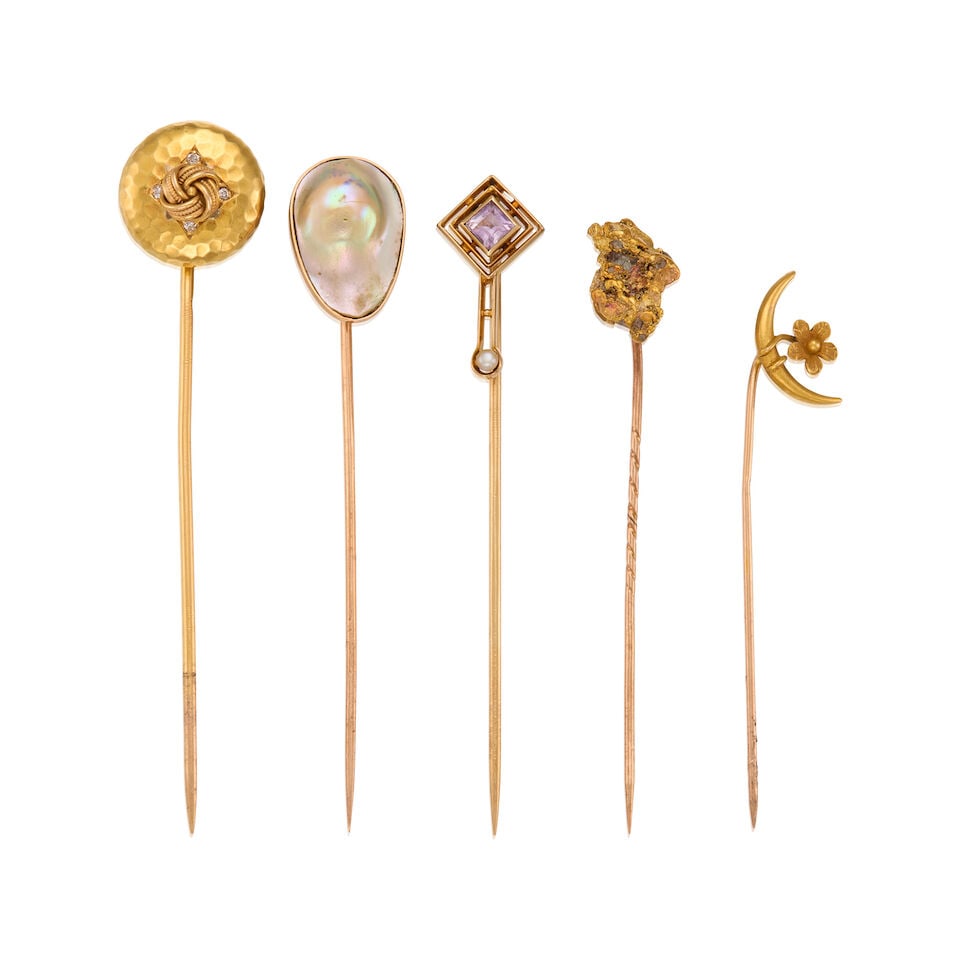 A GROUP OF ANTIQUE STICK PIN: A GROUP OF ANTIQUE STICK PIN • A 18K gold stick pin with four old european cut diamonds weighing approximately 0.01 carat total, measures 3 in. x 1/2 in. • A 14K gold stick pin with one sq