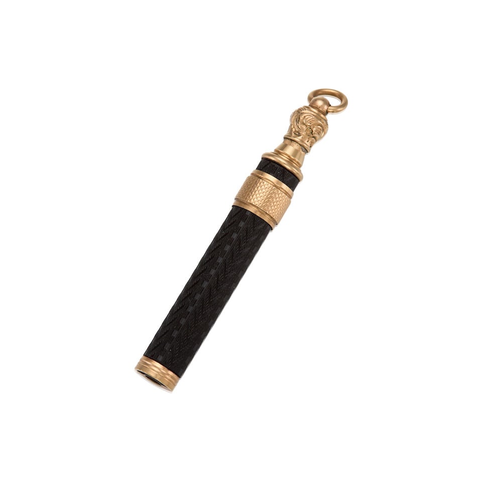 ANTIQUE 10K GOLD AND EBONY PENCIL: ANTIQUE 10K GOLD AND EBONY PENCIL • One carved black ebony with personal engraving • Measures 3 1/4 in. X 1/2 in. • Estimated gross weight: 12.30 grams Footnotes: OVERALL CONDITION: