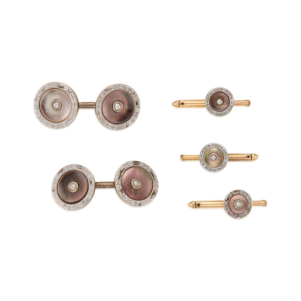 ANTIQUE GOLD SILVER, MOTHER OF PEARL AND ENAMEL SHIRT STUD SET: ANTIQUE GOLD SILVER, MOTHER OF PEARL AND ENAMEL SHIRT STUD SET • A pair of based metal gold plated cufflink with enamel and four mother of pearls measuring 9.87mm in diameter, measures 1 1/4