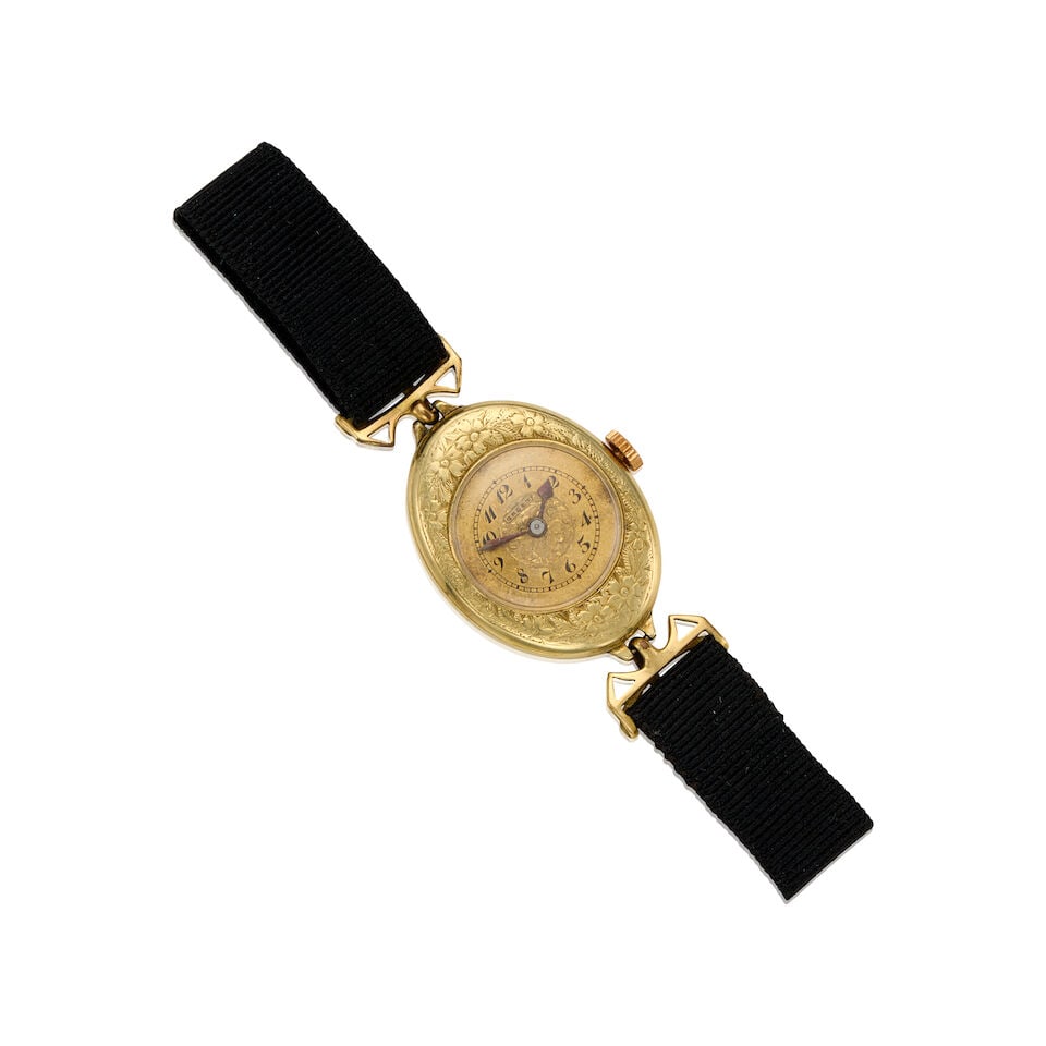 AN ANTIQUE 14K GOLD WATCH (1 of 2)