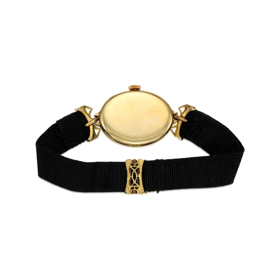 AN ANTIQUE 14K GOLD WATCH - 2