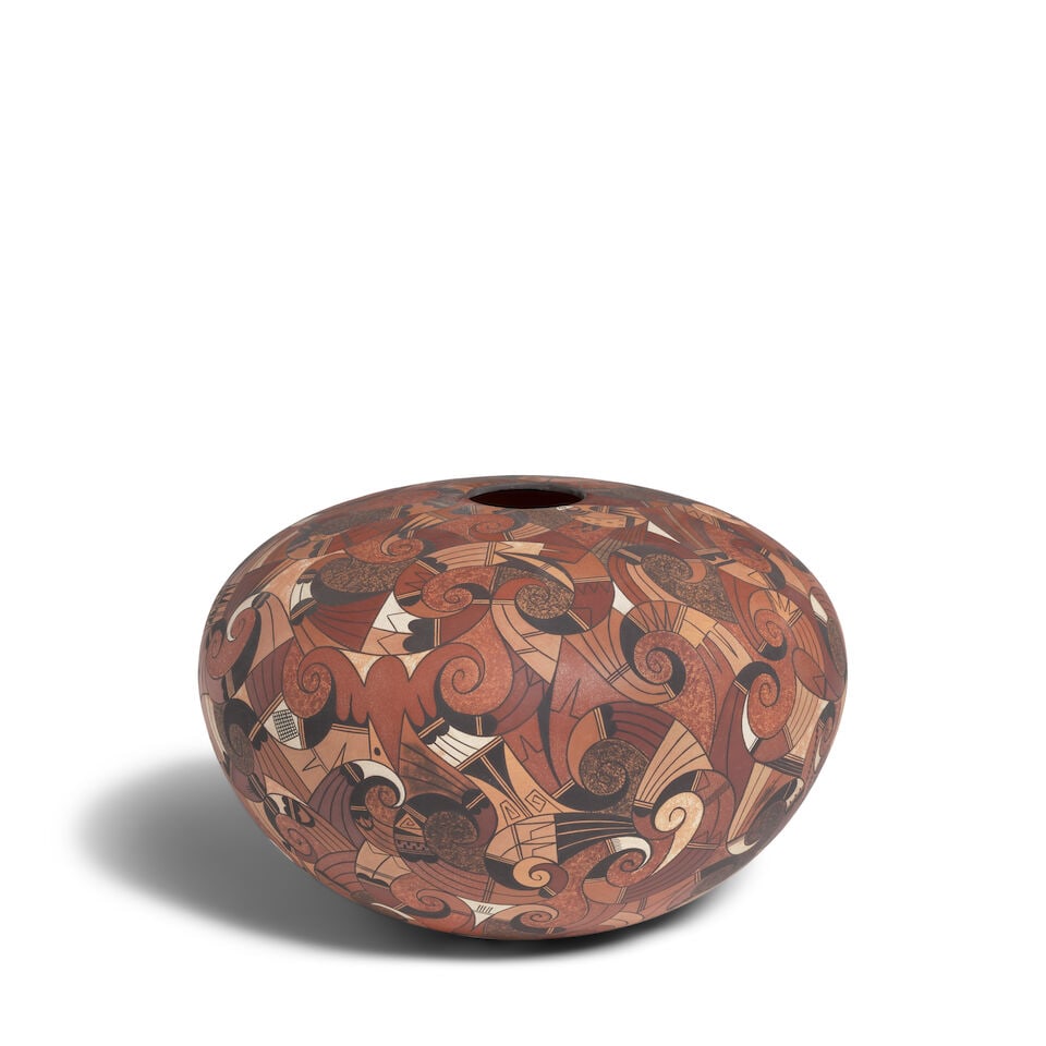 A Jacob Koopee polychrome jar: Jacob Koopee Hopi-Tewa, (1970-2011), a polychrome seed jar, the entire surface finely painted with a dense profusion of avian motifs. diameter 10in, height 6 3/4in Footnotes: Provenance A Private