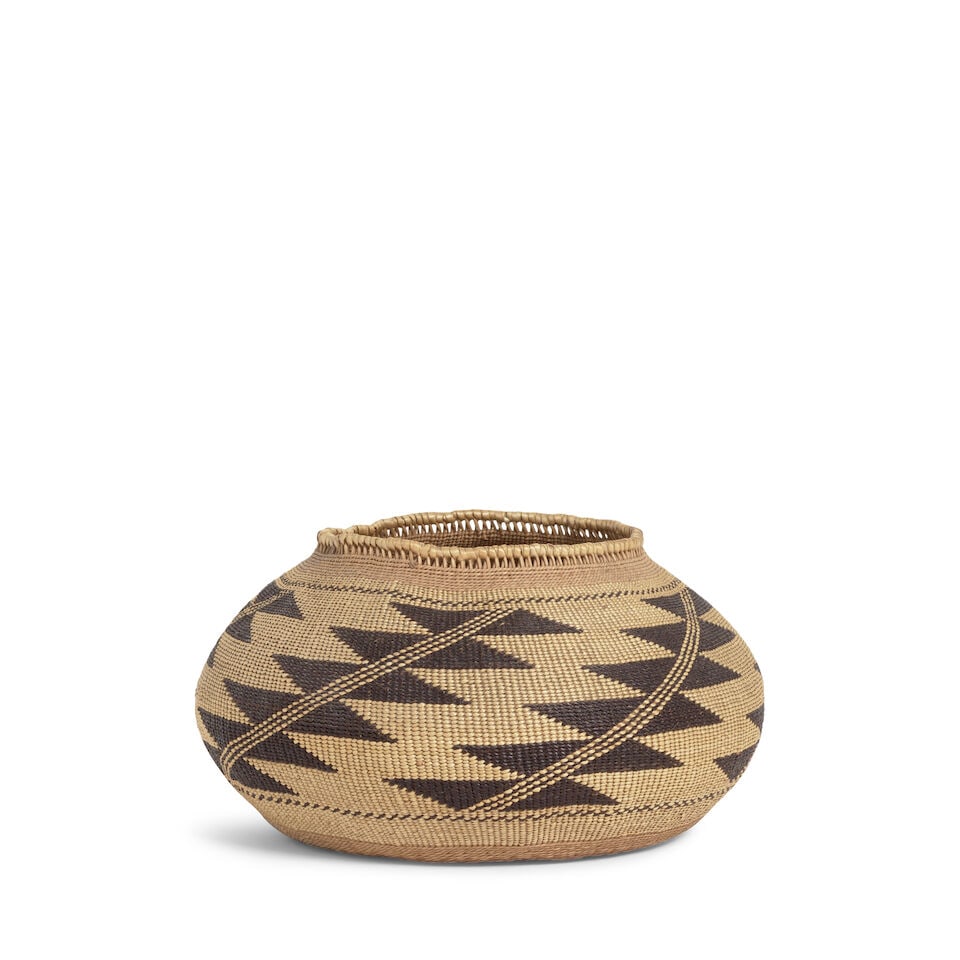 A Wiyot/Karuk basket attributed to Elizabeth Hickox: Elizabeth Hickox (attributed) Wiyot/Karuk, (1875-1947), very finely and precisely woven, a series of serrated diagonals ascending the sides, with openwork rim finish. diameter 7 3/4in, height 4