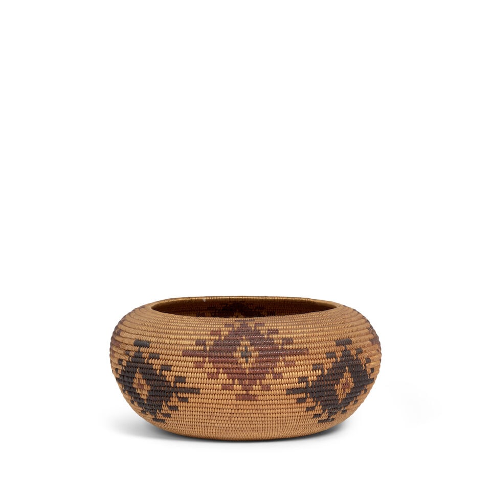 A Maidu polychrome basket: A Maidu polychrome basket Alternating complex hooked diamond motifs in staggered rows. diameter 6 3/4in, height 3 1/4in Footnotes: Provenance Kania-Ferrin Gallery, Santa Fe, NM A Private Midwest