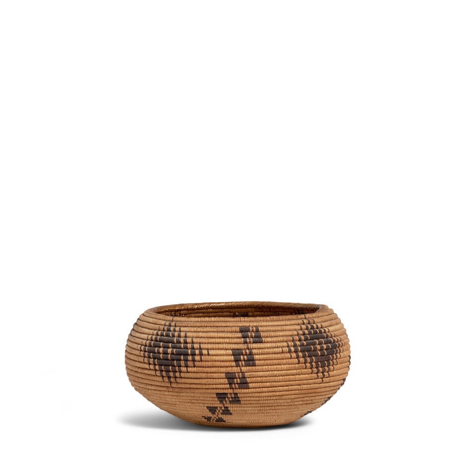 A Washoe polychrome basket, possibly the work of Maggie Mayo James: A Washoe polychrome basket Possibly the work of Maggie Mayo James, (c.1870-1952), of degikup form, four diagonal columns of bisected box forms alternating with finely serrated diamond