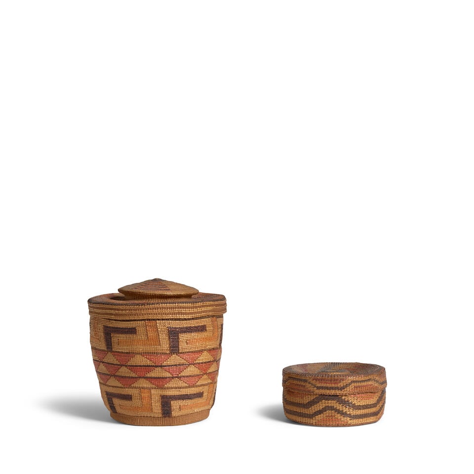 Two Tlingit polychrome rattletop baskets: Two Tlingit polychrome rattletop baskets The larger example with the body worked in fretwork rings separated by a band of duotone triangles, the lid with 6-pointed star and banded knop; the smaller