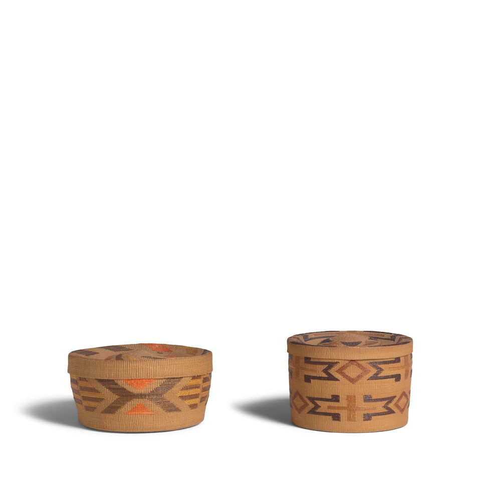 Two Tlingit polychrome rattletop baskets: Two Tlingit polychrome rattletop baskets The wider example with a single band of alternating geometric motifs about the body, the lid with two bands of parallelograms encircling the edge and center; t