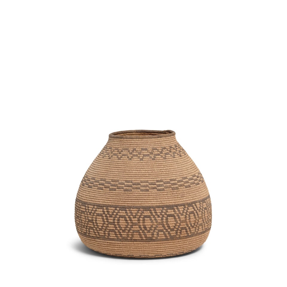 A Chemehuevi olla: A Chemehuevi olla A finely woven example, with distinctive bands of geometric meanders and checkerboard rows. diameter 6 3/8in, height 6in Footnotes: Provenance ex-Robert and Claire Hardiman, Pennsylv