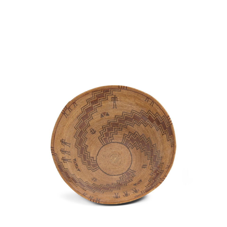 A Kawaiisu polychrome pictorial basket: A Kawaiisu polychrome pictorial basket Finely woven with four stepped diagonals radiating from the base, two open registers populated with trios of human figures alongside triangle motif accents, a