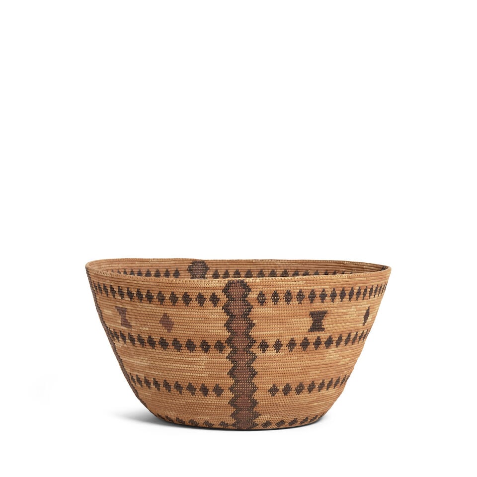 A Western Mono polychrome basket: A Western Mono polychrome basket Bands of diamonds set between serrate columns, diamonds and hourglass motifs as accents. diameter 12 1/4in, height 6in Footnotes: Provenance Transitional Arts,
